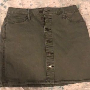 Olive green denim mini skirt.